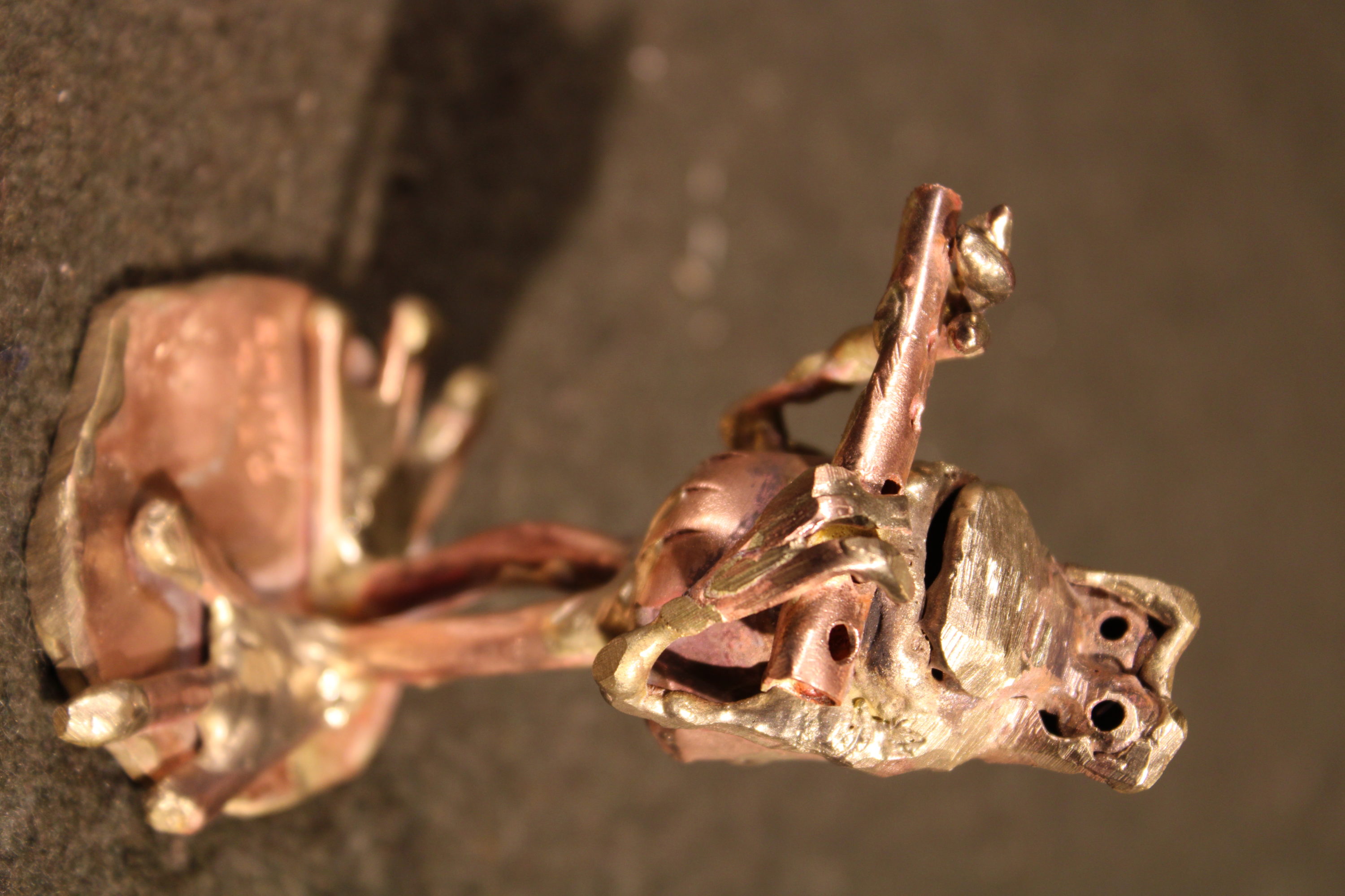 This image has an empty alt attribute; its file name is flute-playing-froglet-beau-smith-metal-sculpture-4-21-20-copper-bronze-12-3000x2000.jpg